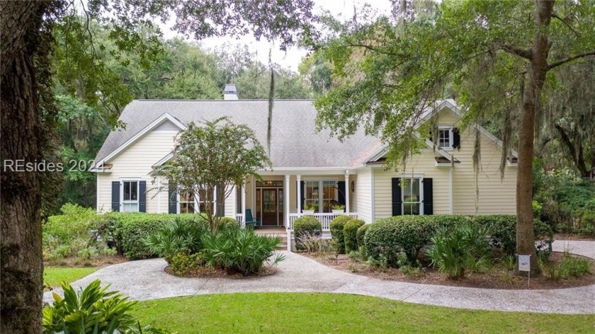 Live oaks drape the street as you approach this charming low - Beach Home for sale in Daufuskie Island, South Carolina on Beachhouse.com