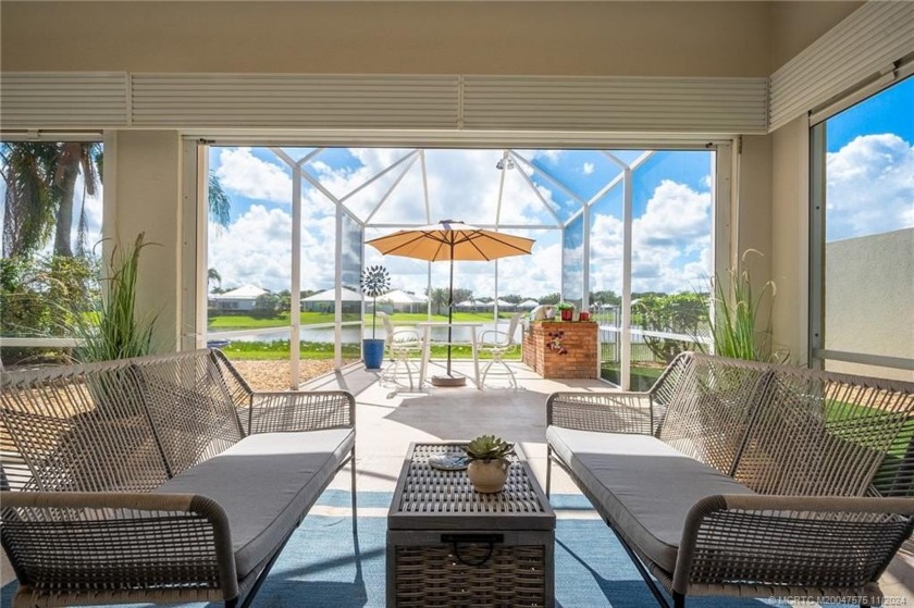 BREATHTAKING PANORAMIC LAKE VIEWS await in this beautifully - Beach Home for sale in Palm City, Florida on Beachhouse.com