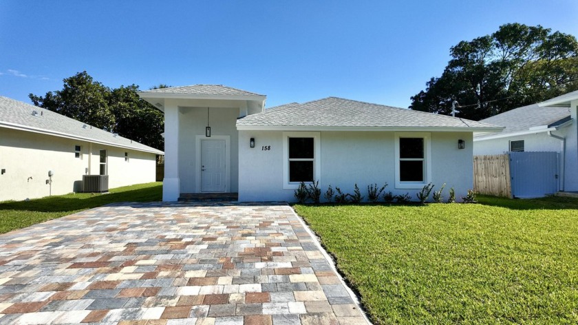 Gorgeous new construction single family residence located in the - Beach Home for sale in West Palm Beach, Florida on Beachhouse.com