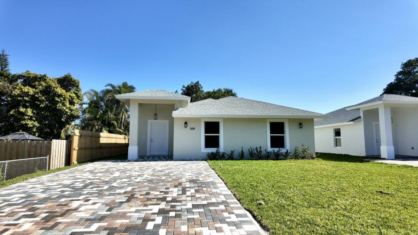 Gorgeous new construction single family residence located in the - Beach Home for sale in West Palm Beach, Florida on Beachhouse.com