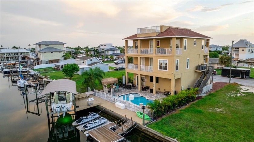 This Ultimate WATERFRONT POOL home* HUDSON BEACH* with quick - Beach Home for sale in Hudson, Florida on Beachhouse.com