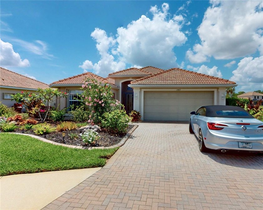 This custom-appointed home offers resort-style living with - Beach Home for sale in Venice, Florida on Beachhouse.com