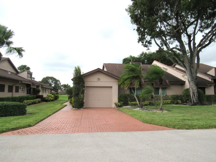 In the Heart of it All!  This Villa is Just That! Walk into your - Beach Home for sale in Lake Worth, Florida on Beachhouse.com