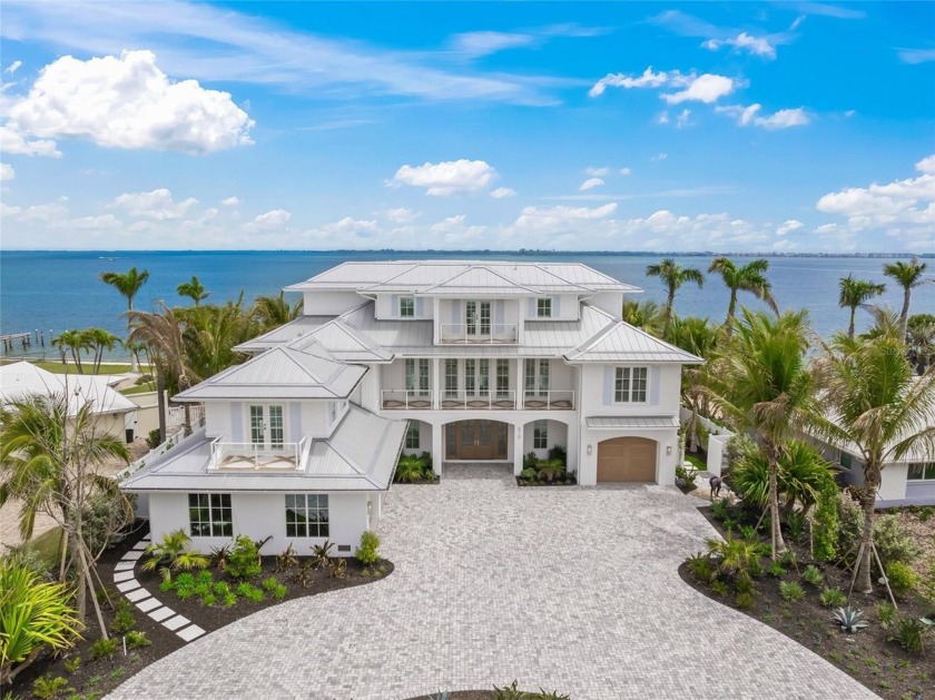 Experience the pinnacle of coastal luxury with this newly - Beach Home for sale in Holmes Beach, Florida on Beachhouse.com