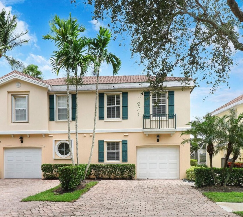 NEW ROOF, SCREENED POOL and long lake sunrise views!! This - Beach Townhome/Townhouse for sale in Palm Beach Gardens, Florida on Beachhouse.com