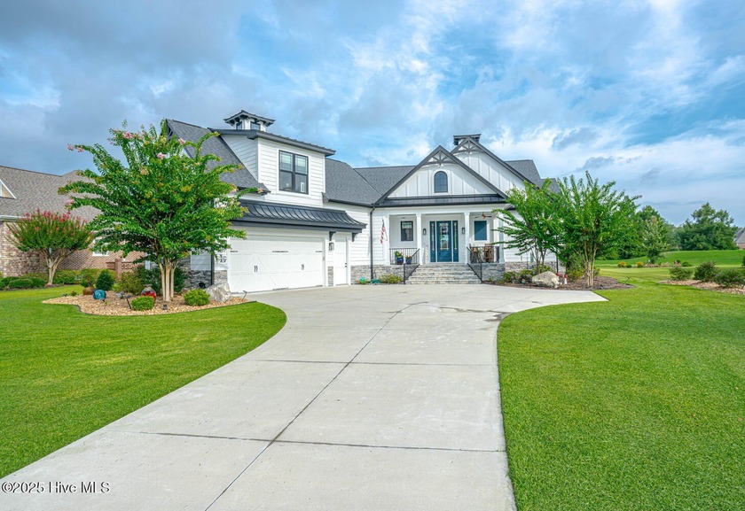 INCREDIBLE CURB APPEAL and stunning green-to-tee views of the #1 - Beach Home for sale in Calabash, North Carolina on Beachhouse.com