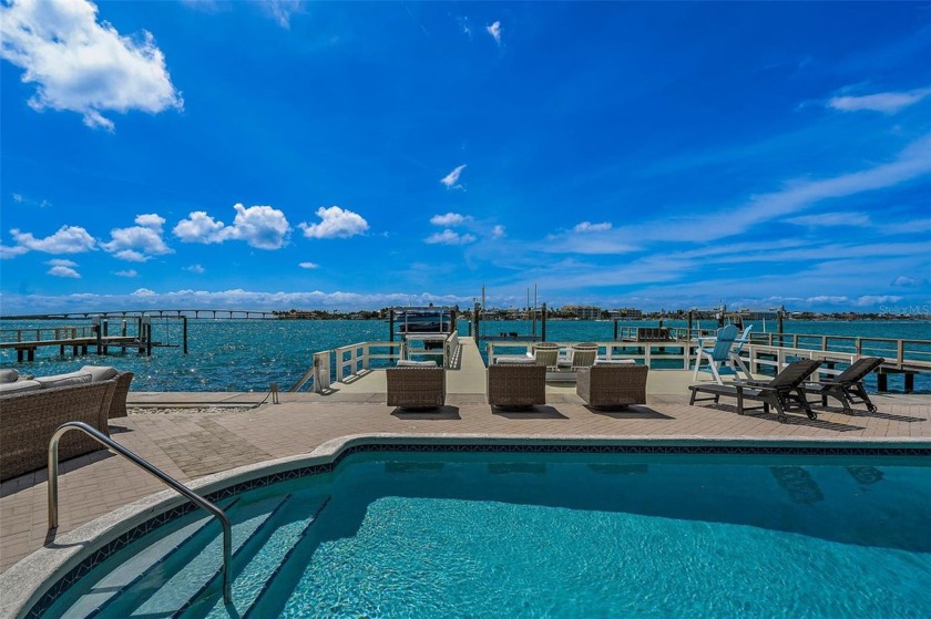 The ultimate in waterfront living is waiting for you in this - Beach Home for sale in ST Pete Beach, Florida on Beachhouse.com