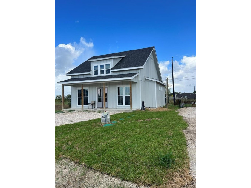 Experience custom craftsmanship and coastal charm in this - Beach Home for sale in Rockport, Texas on Beachhouse.com