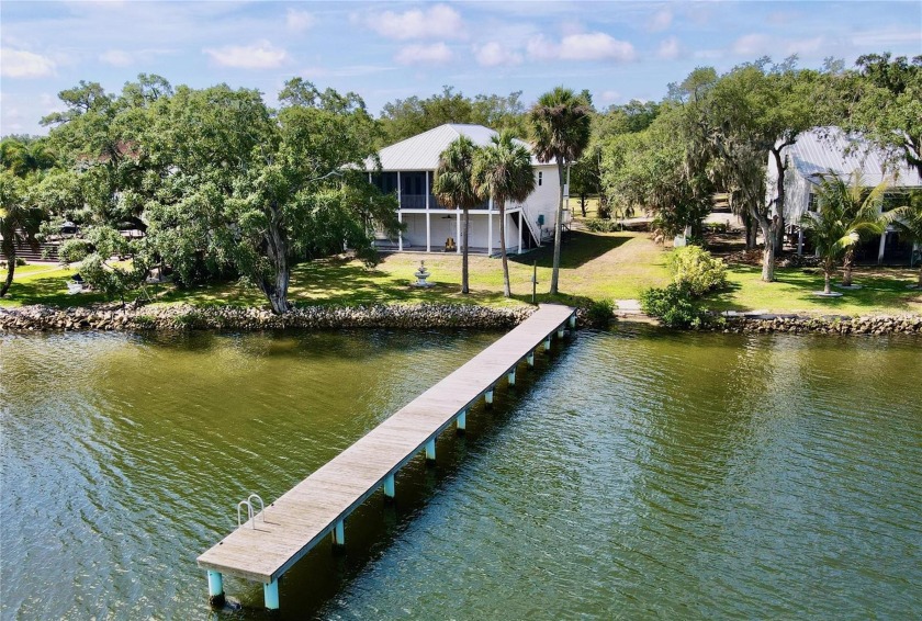 Welcome to your dream home nestled on almost one acre of - Beach Home for sale in Tampa, Florida on Beachhouse.com