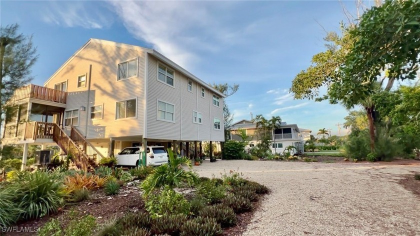 Desirable location property ideally situated across the street - Beach Townhome/Townhouse for sale in Sanibel, Florida on Beachhouse.com