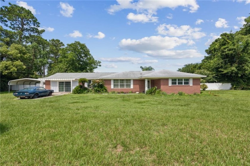 A HORSE LOVERS DREAM with NO HOA!! Charming All-Brick Ranch - Beach Home for sale in Saint Marys, Georgia on Beachhouse.com