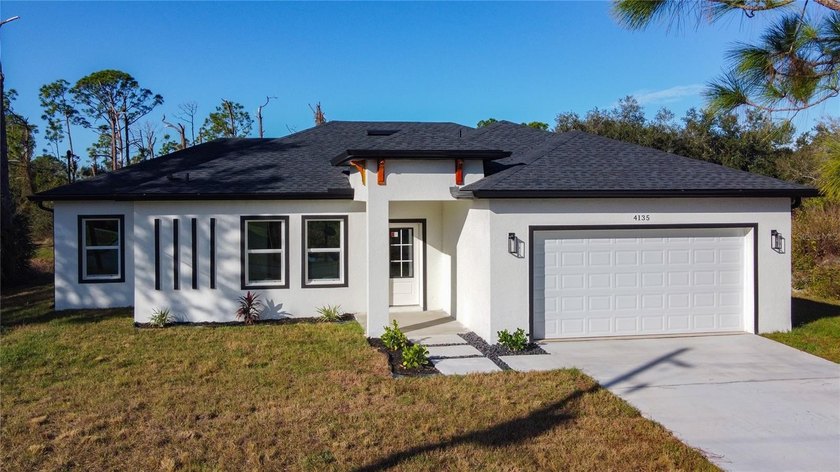 Discover this brand-new construction home in the growing - Beach Home for sale in Lehigh Acres, Florida on Beachhouse.com