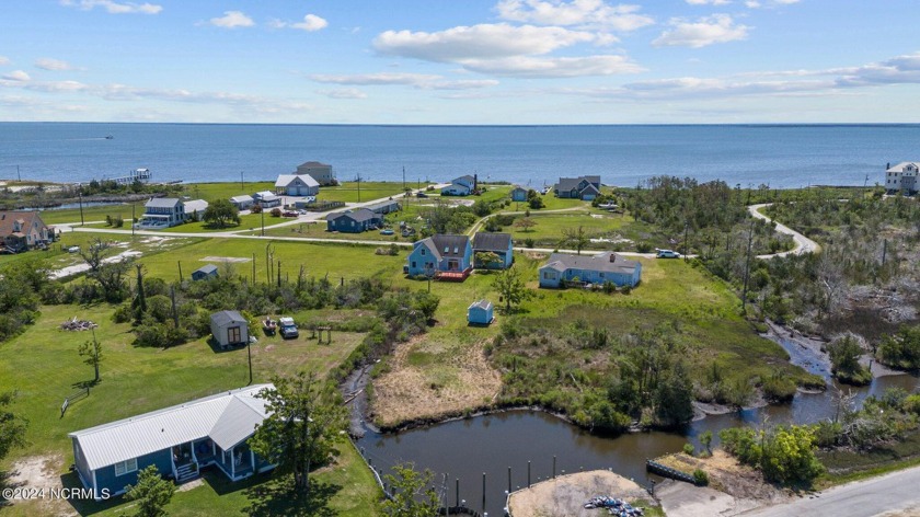 Live the Island Life From This Davis Canalfront Home.  3 bedroom - Beach Home for sale in Davis, North Carolina on Beachhouse.com