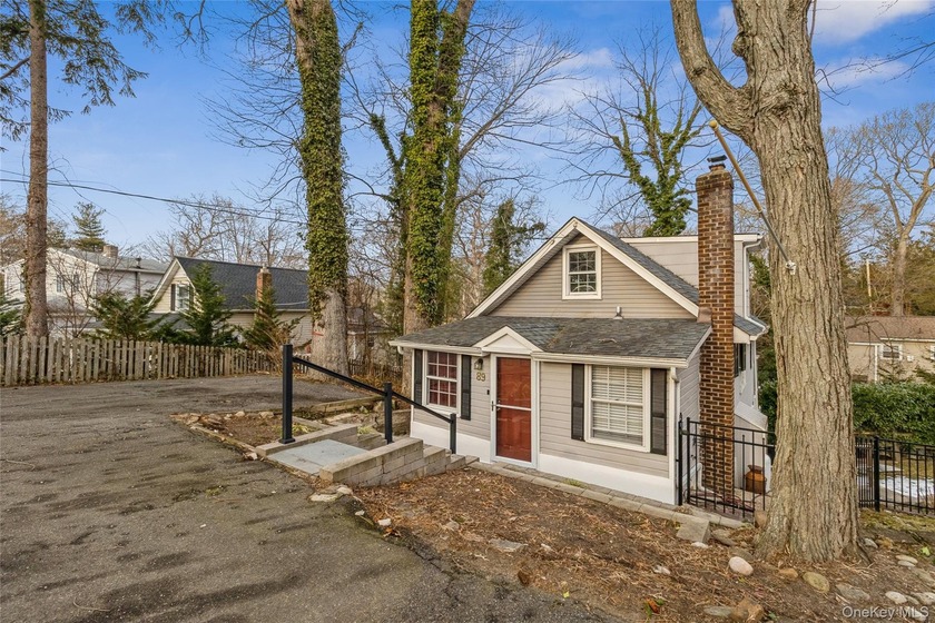 Experience the perfect blend of space and tranquility. Tucked - Beach Home for sale in Sound Beach, New York on Beachhouse.com