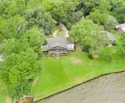 GORGEOUS MITCHELL BUILT WATERFRONT HOME!! COME RELAX ON THE HUGE - Beach Home for sale in Theodore, Alabama on Beachhouse.com