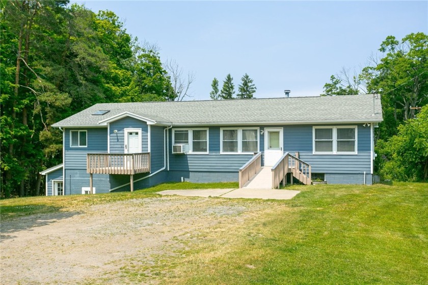 Welcome to 7893 Lake Road, a stunning three-bedroom - Beach Home for sale in Sodus, New York on Beachhouse.com