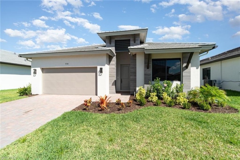 Step into comfort with this move-in-ready, never lived in, brand - Beach Home for sale in Ave Maria, Florida on Beachhouse.com