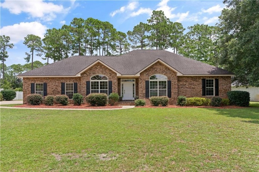 Classic brick home located in Southern Landing situated on a - Beach Home for sale in Brunswick, Georgia on Beachhouse.com