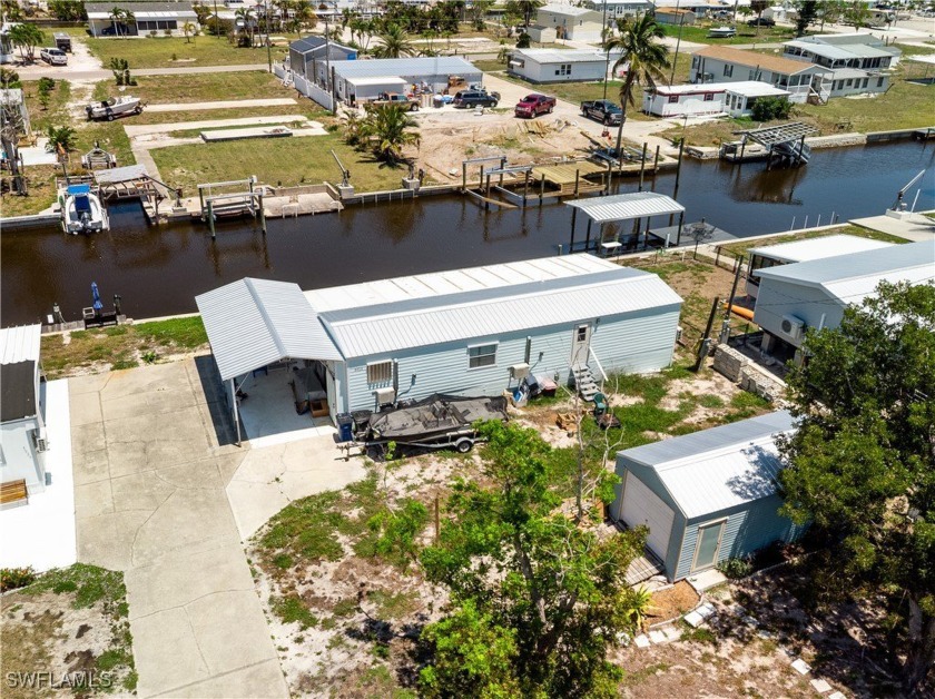 Mostly renovated waterfront mobile home located in Flamingo Bay - Beach Home for sale in St. James City, Florida on Beachhouse.com