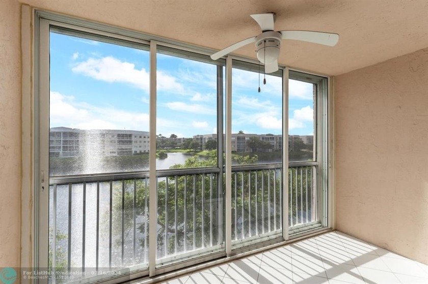 Experience Breathtaking Direct Lake Views from Your New Move-In - Beach Condo for sale in Tamarac, Florida on Beachhouse.com