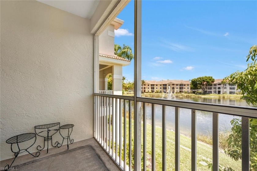 Own this Tranquil LAKEFRONT, lighted fountain view of this 2 - Beach Home for sale in Naples, Florida on Beachhouse.com