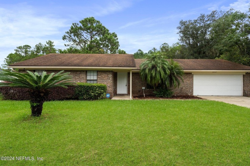 This beautiful 3 bed 2 bath home is nestled on over an acre of - Beach Home for sale in Jacksonville, Florida on Beachhouse.com