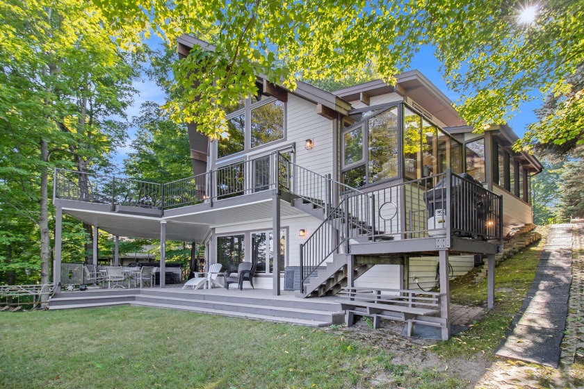 Hamlin Lake Waterfront retreat-Discover 223 feet of private - Beach Home for sale in Ludington, Michigan on Beachhouse.com