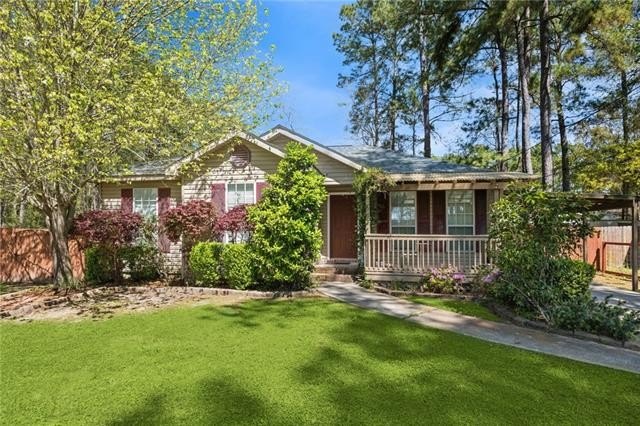 This three bedroom, two bath home features a central Mandeville - Beach Home for sale in Mandeville, Louisiana on Beachhouse.com