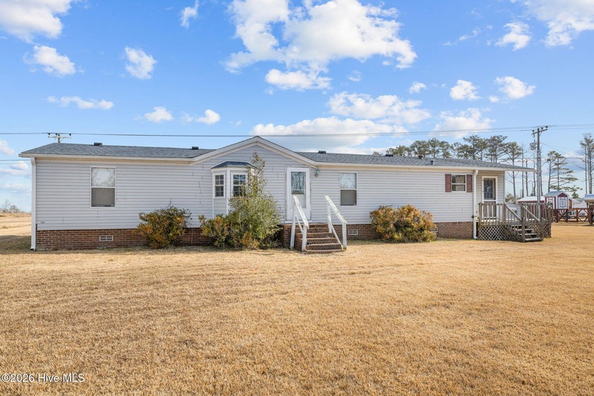 Experience true Down East waterfront living on this remarkable 6 - Beach Home for sale in Davis, North Carolina on Beachhouse.com