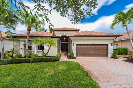 Beautiful single-story lakefront home in the quiet gated - Beach Home for sale in Miramar, Florida on Beachhouse.com