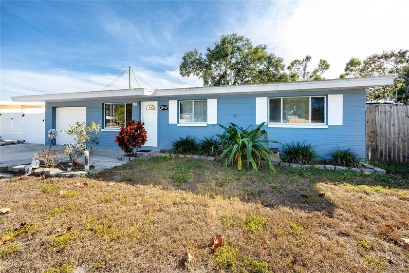 Centrally located, this 4-bedroom, 2-bathroom single-family - Beach Home for sale in Seminole, Florida on Beachhouse.com