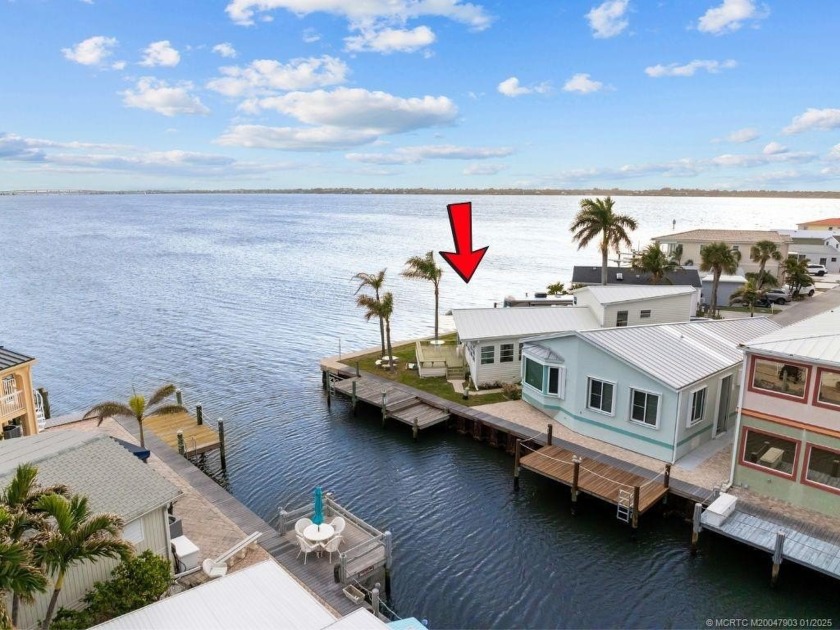 WATER, WATER EVERYWHERE! A RARE FIND--53 FEET OF OPEN WATER - Beach Home for sale in Jensen Beach, Florida on Beachhouse.com