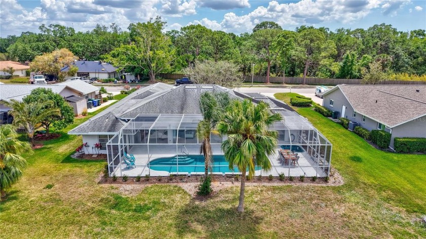 Welcome to this beautifully spacious 2,986 sq ft pool home - Beach Home for sale in Sarasota, Florida on Beachhouse.com
