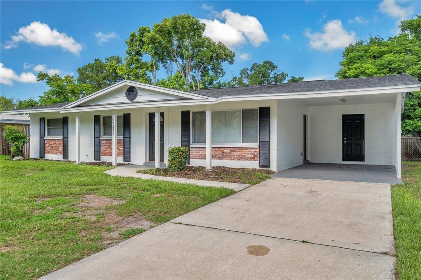 WELCOME to this MOVE-IN READY 4 Bedroom, 2 Bath Home in Lake - Beach Home for sale in Tampa, Florida on Beachhouse.com