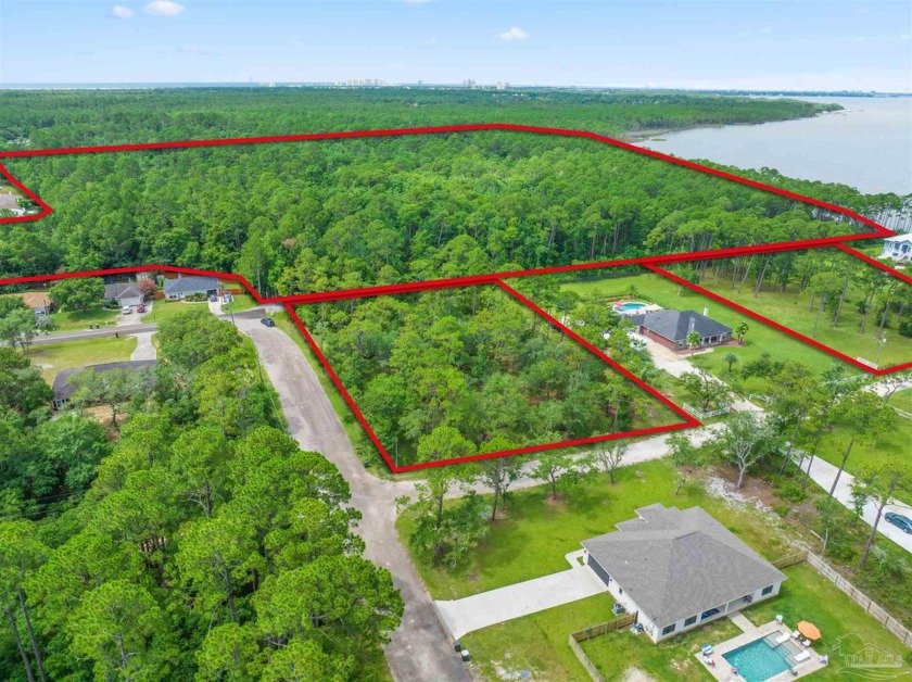 Discover the unparalleled beauty and potential of this expansive - Beach Acreage for sale in Pensacola, Florida on Beachhouse.com