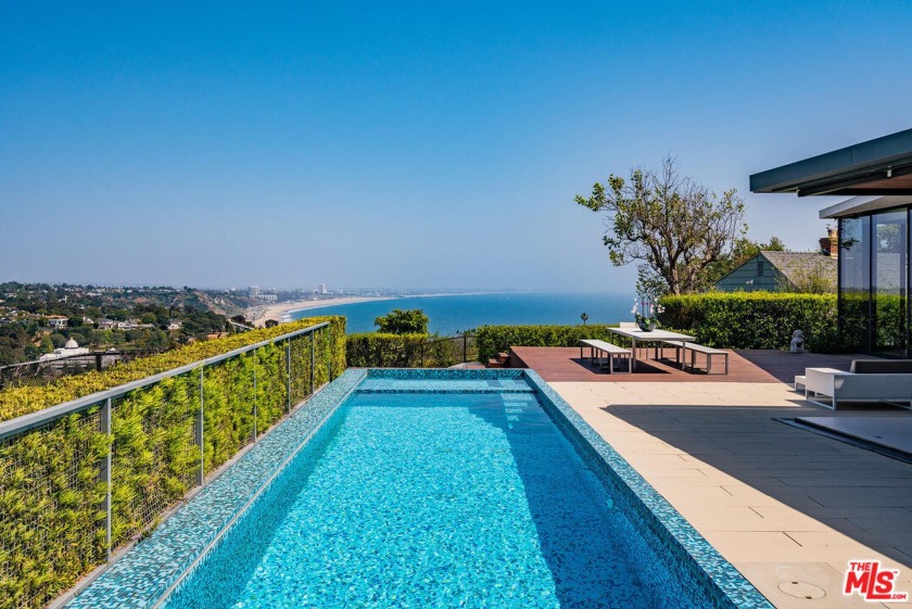Idyllic coastal living awaits you in this modern paradise set in - Beach Home for sale in Pacific Palisades, California on Beachhouse.com