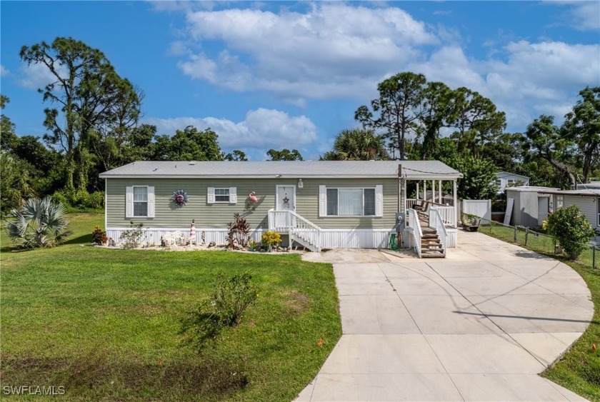 This immaculate double wide residence offers comfort and - Beach Home for sale in Punta Gorda, Florida on Beachhouse.com