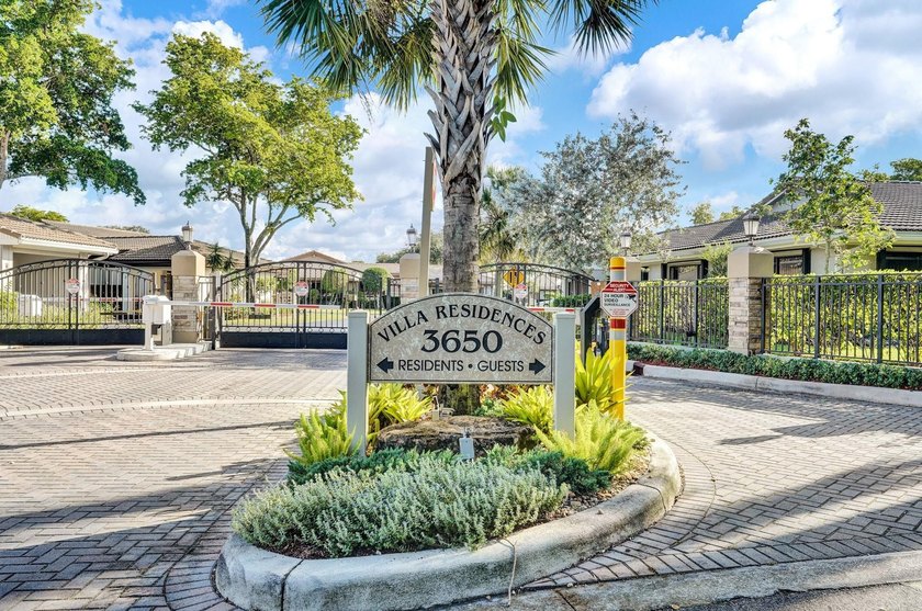 Located in a Gated Community, this well-appointed Villa offers a - Beach Home for sale in Hollywood, Florida on Beachhouse.com