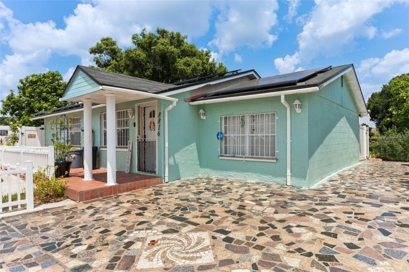 A well-maintained home with 4 bedrooms, 2 bathrooms, and 4 car - Beach Home for sale in Tampa, Florida on Beachhouse.com