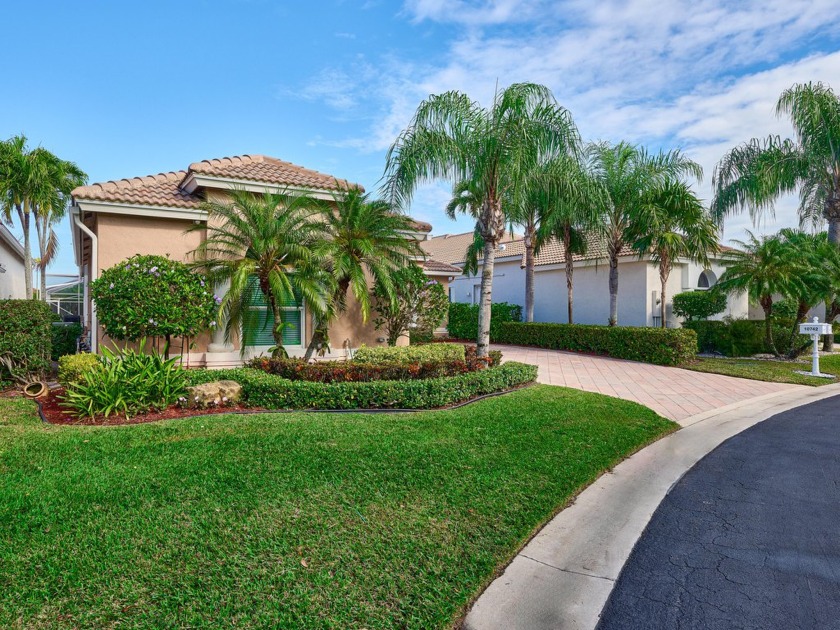 Spectacular 4-Bedroom Pool Home with Water and Golf Views in - Beach Home for sale in Lake Worth, Florida on Beachhouse.com