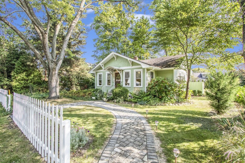 This beach-style bungalow beautifully blends vintage charm with - Beach Home for sale in New Buffalo, Michigan on Beachhouse.com