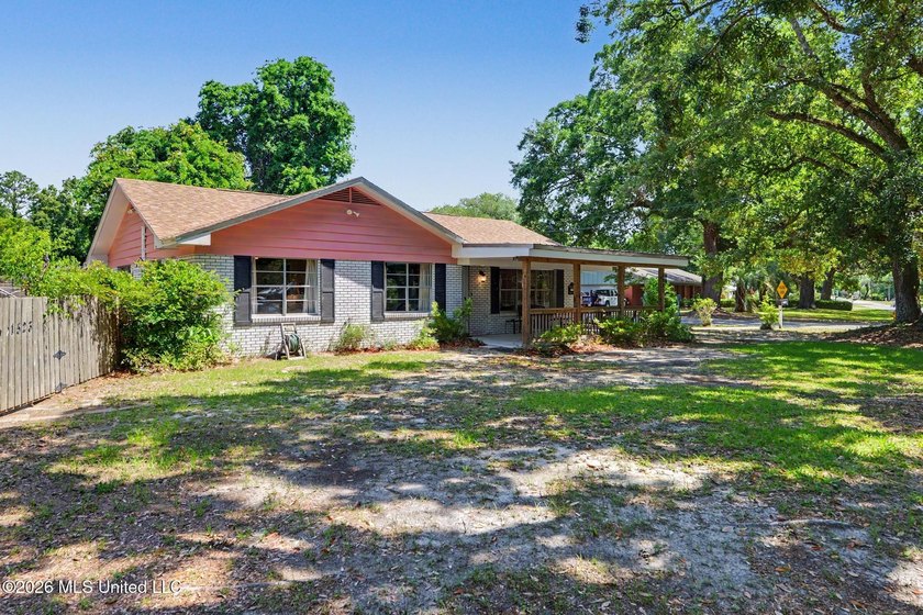 Just Listed a Coastal Bungalow with mid-century charm - STR - Beach Home for sale in Pass Christian, Mississippi on Beachhouse.com