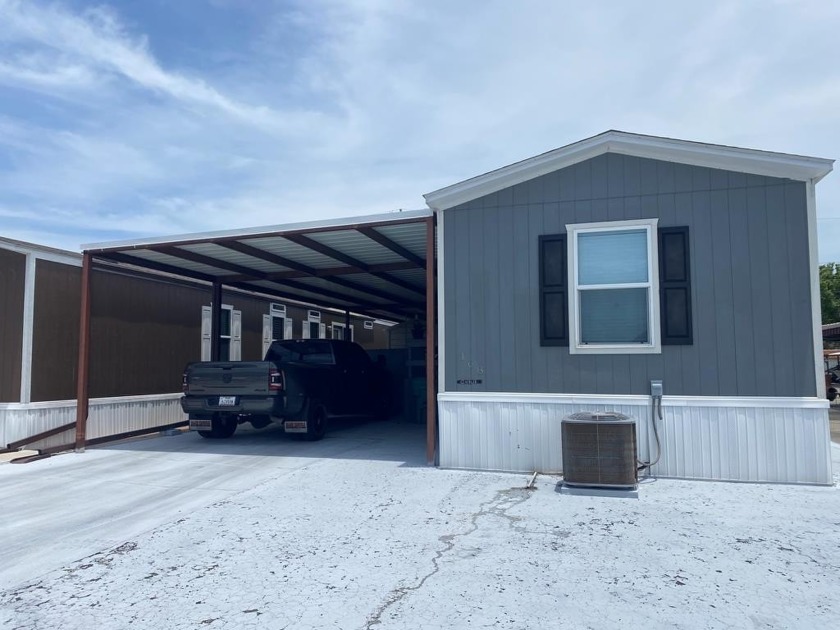 This adorable 3-bedroom, 2-bathroom 2021 Clayton manufactured - Beach Home for sale in Aransas Pass, Texas on Beachhouse.com