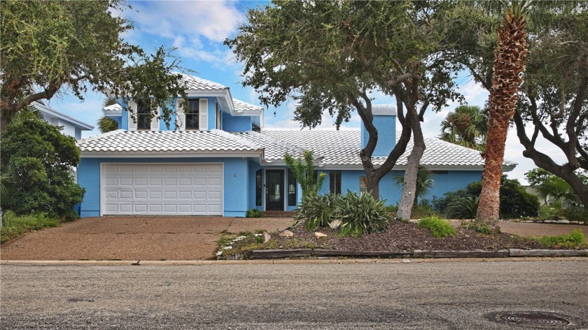 Step into this tropical waterfront villa-style home that checks - Beach Home for sale in Rockport, Texas on Beachhouse.com