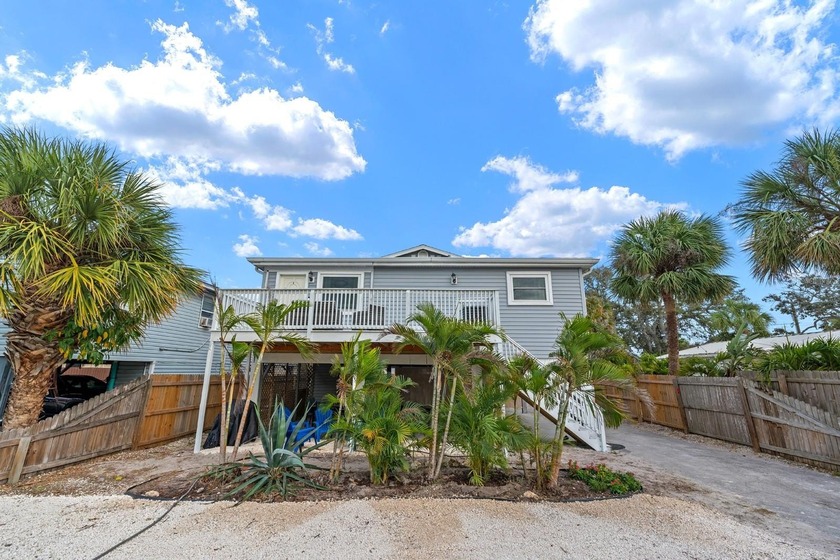 Steps from the sand, this beach duplex in Indian Rocks Beach is - Beach Townhome/Townhouse for sale in Indian Rocks Beach, Florida on Beachhouse.com