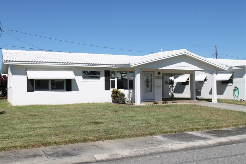 This single-family home located in Unit 2 of Mainlands by the - Beach Home for sale in Pinellas Park, Florida on Beachhouse.com