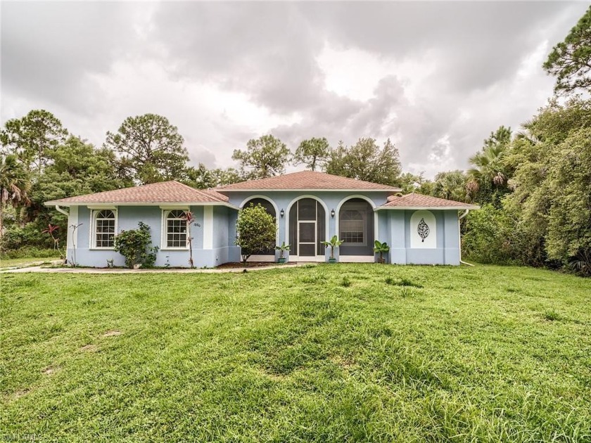 Escape the urban congestion when you make this 3-bedroom plus - Beach Home for sale in Naples, Florida on Beachhouse.com