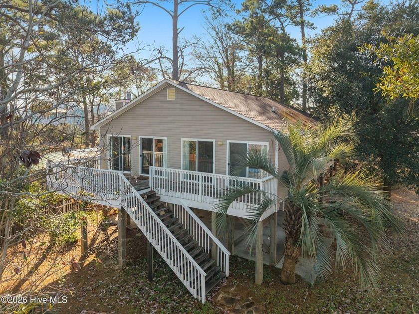 Experience the ultimate coastal lifestyle in this entertainer's - Beach Home for sale in Oak Island, North Carolina on Beachhouse.com