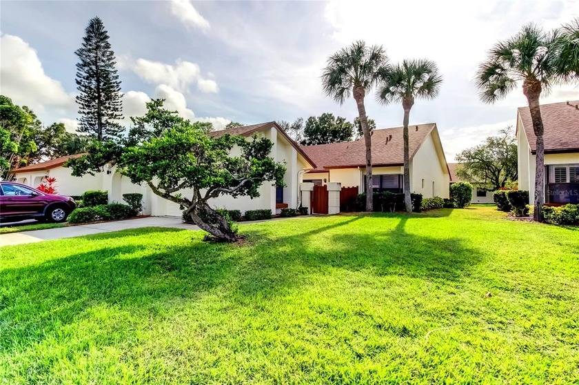 Pride of ownership shines throughout this beautifully maintained - Beach Home for sale in Clearwater, Florida on Beachhouse.com