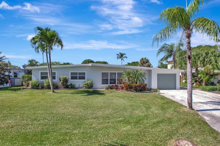 Enjoy the ultimate waterfront lifestyle in this exceptional - Beach Home for sale in Lake Worth, Florida on Beachhouse.com